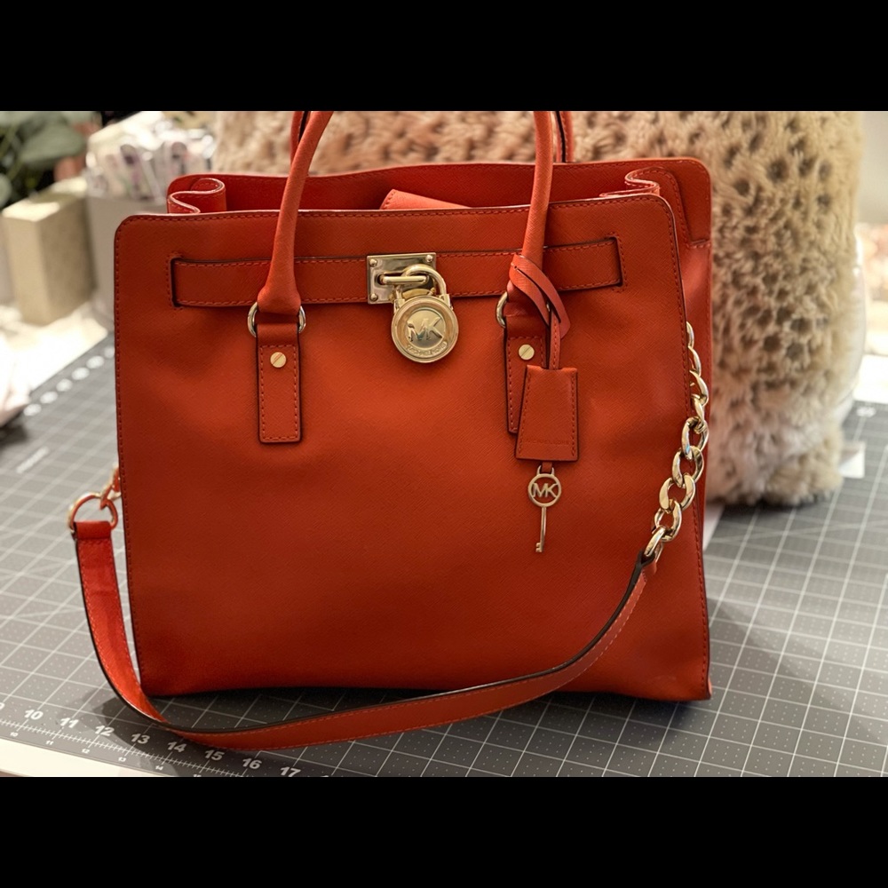 Michael Kors Orange Satchel with Gold Accents. Large and spacious